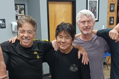 Posed standing smiling wearing workout attire