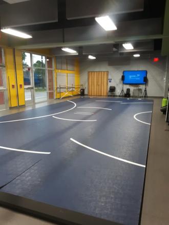 Island Rec Center multi-purpose room with floor matts.